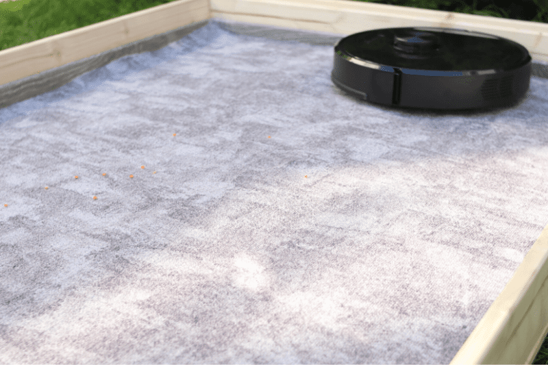 The robot vacuum hardly left any dirt on the short carpet after the lentil suction test.